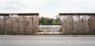 The destruction of this famous barrier began in which year? The destruction of this famous barrier began in which year?