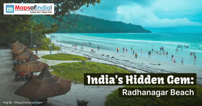 A scenic view of Radhanagar Beach in the Andaman Islands, showing people walking along the shoreline and relaxing under thatched umbrellas.