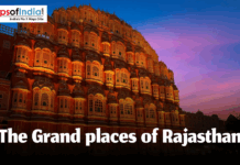 The Grand Palaces of Rajasthan: Tales of Royalty and Valour Illuminated view of Hawa Mahal in Jaipur at sunset, showcasing the architectural grandeur of Rajasthan's royal palaces.