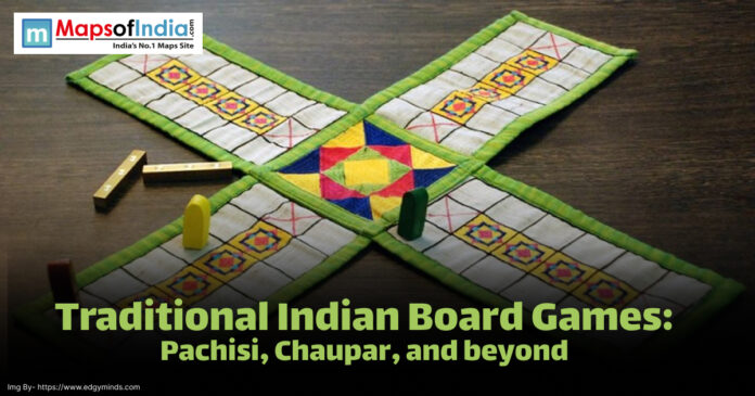 A traditional Indian board game setup featuring Pachisi with colorful fabric board, dice sticks, and game pieces placed on a wooden surface.