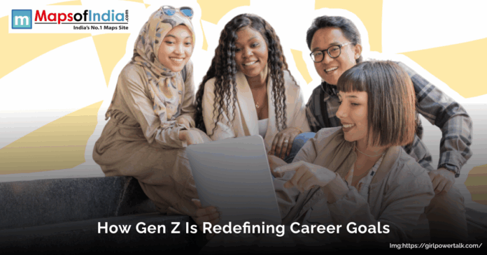 Group of diverse Gen Z professionals collaborating and discussing career goals while looking at a laptop.