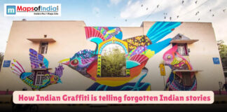 How Indian Graffiti Is Telling Forgotten Indian Stories A vibrant graffiti mural of colorful birds painted across a building wall in India, symbolizing how Indian street art is reviving forgotten local stories.