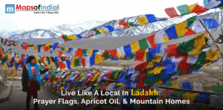 Live Like a Local in Ladakh: Prayer Flags, Apricot Oil, and Mountain Homes A view of Ladakh valley with several colourful flags. The beauty of mountains covered with snow.