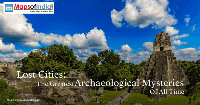 Ancient Mayan ruins surrounded by lush green forest under a bright blue sky with white clouds, representing lost cities and great archaeological mysteries.