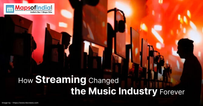 Rows of people using desktop computers with large monitors and headphones, set against a vibrant orange and red background, illustrating the concept of streaming’s impact on the music industry.