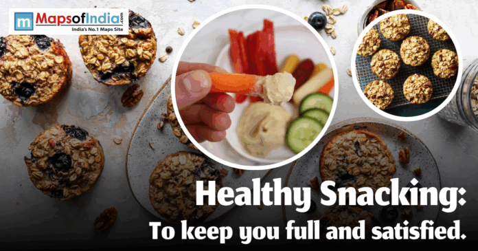 healthy snacking Baked oatmeal cups with blueberries, a hand dipping a carrot stick into hummus surrounded by other vegetable slices, and a close-up of oatmeal cookies on a cooling rack, illustrating healthy snacking.