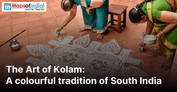 Image of women drawing art of Kolam on the floor