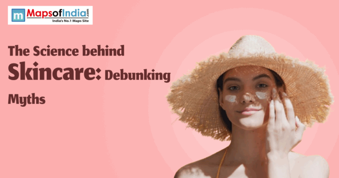 A woman wearing a sun hat applies sunscreen on her face against a pink background, with the text “The Science behind Skincare: Debunking Myths” and the Maps of India logo.