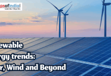 Renewable Energy Trends: Solar, Wind, and Beyond Solar panels and wind turbines at sunset representing renewable energy trends in India.