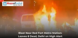 Blast Near Red Fort Metro Station: Leaves 8 Dead, Delhi on High Alert A van engulfed in flames after a blast near Red Fort Metro Station, with emergency alert text overlayed.