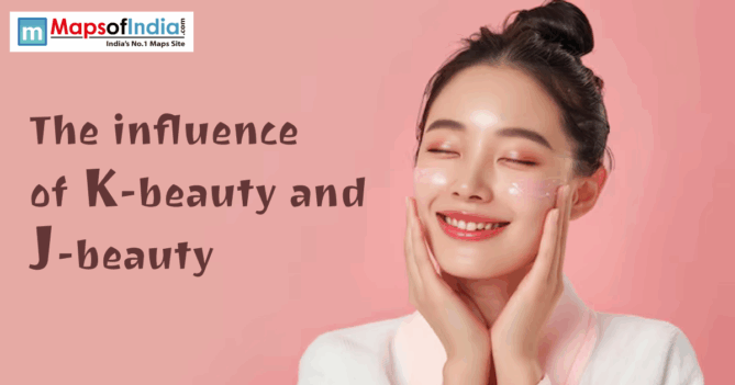 A woman with glowing skin applies skincare cream to her cheeks while smiling, representing the concept of K-beauty and J-beauty.