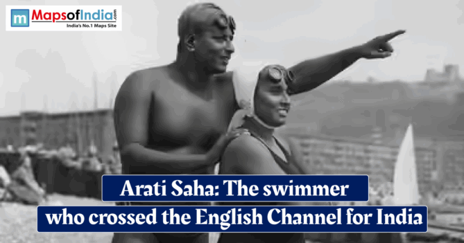Historic black‑and‑white photo of Indian swimmer Arati Saha in a swimsuit on a beach, guided by a man pointing toward the sea, with overlaid text reading “Arati Saha: The swimmer who crossed the English Channel for India.”
