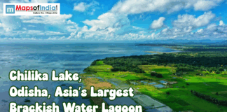 Chilika Lake, Odisha: Asia’s Largest Brackish Water Lagoon Aerial view of Chilika Lake in Odisha, India, with green fields meeting the blue brackish water lagoon under a bright, cloudy sky and Maps of India logo and title text overlay.