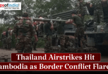 Thailand Airstrikes Hit Cambodia as Border Conflict Flares Soldiers loading a large, possibly rocket-propelled, weapon on a military vehicle with the text overlay "Thailand Airstrikes Hit Cambodia as Border Conflict Flares."