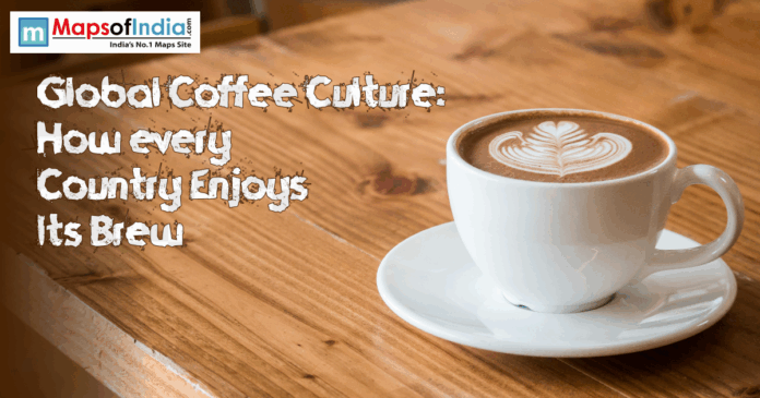 Global Coffee culture A cup of coffee placed on a brown table with a logo of maps of india on the left corner of the image