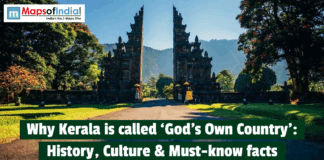 Why Kerala is called God’s Own Country: History, Culture, and Must Know Facts Stone temple gate surrounded by lush greenery in Kerala, symbolizing why Kerala is called God’s Own Country, highlighting its natural beauty and rich cultural heritage.