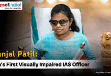 Pranjal Patil: India’s First Visually Impaired IAS Officer Pranjal Patil, India's first visually impaired IAS officer, sits at her desk with a small Indian flag and the Ashoka Pillar emblem.