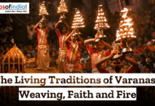 The Living Traditions of Varanasi Weaving Faith and Fire Priests performing Ganga Aarti in Varanasi, holding multi-tiered fire lamps during an evening ritual, showcasing the city’s living traditions of faith and fire along the Ganges.