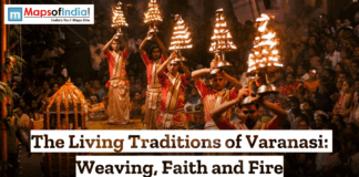 The Living Traditions of Varanasi Weaving Faith and Fire Priests performing Ganga Aarti in Varanasi, holding multi-tiered fire lamps during an evening ritual, showcasing the city’s living traditions of faith and fire along the Ganges.
