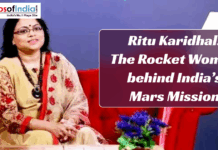 Ritu Karidhal: The Rocket Woman Behind India’s Mars Mission Indian aerospace scientist Ritu Karidhal sitting on a red sofa in a beige and red saree, with a text banner that reads “Ritu Karidhal: The Rocket Woman behind India’s Mars Mission” on a purple background.