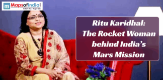 Ritu Karidhal: The Rocket Woman Behind India’s Mars Mission Indian aerospace scientist Ritu Karidhal sitting on a red sofa in a beige and red saree, with a text banner that reads “Ritu Karidhal: The Rocket Woman behind India’s Mars Mission” on a purple background.