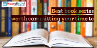 Best book series worth committing your time to Open book on a table with blurred bookshelves in the background, featuring text “Best book series worth committing your time to” and Maps of India logo.