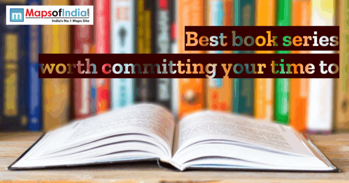 Best Book Open book on a table with blurred bookshelves in the background, featuring text “Best book series worth committing your time to” and Maps of India logo.