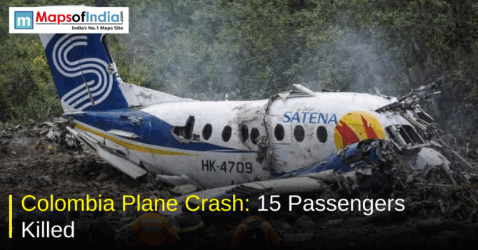 Wreckage of a SATENA aircraft after a plane crash in a forested area in Colombia, with smoke rising and text reading “Colombia Plane Crash: 15 Passengers Killed” and Maps of India logo