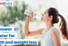 The Power Of Water For Health And Weight Loss An Asian woman with her hair in a ponytail is outdoors, drinking water from a clear plastic bottle. The text on the image reads, "The power of water for Health and weight loss," with a "Maps of India" logo in the top left corner.