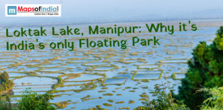 Loktak Lake, Manipur: Why it’s India’s only Floating Park Wide view of Loktak Lake in Manipur showing floating vegetation islands and wetlands, with text highlighting it as India’s only floating park