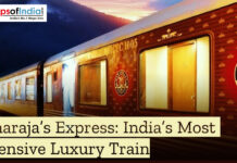 Maharaja’s Express: India’s Most Expensive Luxury Train Maharaja’s Express luxury train parked at a station, showcasing its royal exterior and branding, with the title “Maharaja’s Express: India’s Most Expensive Luxury Train” displayed on the image.