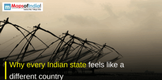 Why every Indian state feels like a different country Sunset view of traditional Chinese fishing nets along a calm waterfront, with the text “Why every Indian state feels like a different country” and the MapsofIndia.com logo displayed on the image.