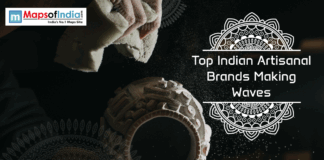 Top Indian Artisanal Brands Making Waves A close-up of an artisan dusting a handcrafted clay pot, with decorative mandala designs and the text “Top Indian Artisanal Brands Making Waves” displayed on a dark background alongside the Maps of India logo