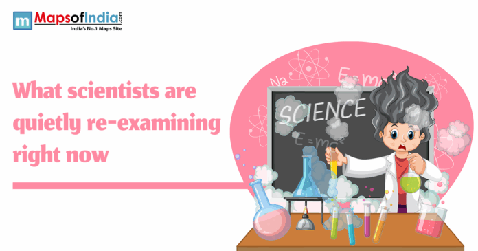 Illustration showing a cartoon scientist conducting a chaotic experiment in a lab, with bubbling flasks and smoke, alongside the text “What scientists are quietly re-examining right now” and Maps of India logo