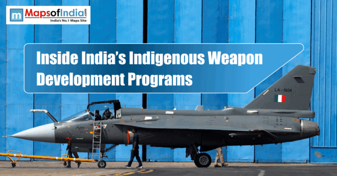 Indian Tejas fighter jet displayed in front of a blue hangar with the title “Inside India’s Indigenous Weapon Development Programs.”