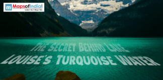 The Secret Behind Lake Louise’s Turquoise Water Turquoise water of Lake Louise surrounded by dark mountains and snow-capped peaks with the text "The Secret Behind Lake Louise's Turquoise Water."