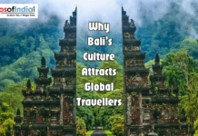 Why Bali’s Culture Attracts Global Travellers Ornate Balinese stone split gateway Candi Bentar in a lush green tropical forest with text "Why Bali’s Culture Attracts Global Travellers."
