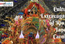 Cultural Extravaganza of Rio De Janeiro Carnival Colorful parade float and dancers performing during the Rio de Janeiro Carnival with a large crowd in the background.