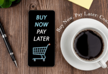 Buy Now, Pay Later: Convenience or Debt Trap? Smartphone with "Buy Now Pay Later" on screen next to a cup of coffee.