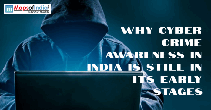 A hooded hacker at a laptop with the text "Why Cyber Crime Awareness in India is Still in its Early Stages."