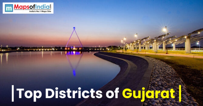 Scenic waterfront view in Gujarat at sunset with illuminated walkway and modern architectural structure, showcasing urban development