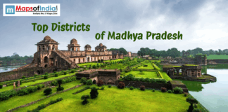 Top Districts of Maharashtra Top districts of Madhya Pradesh banner featuring historic fort and lush green landscape near water body