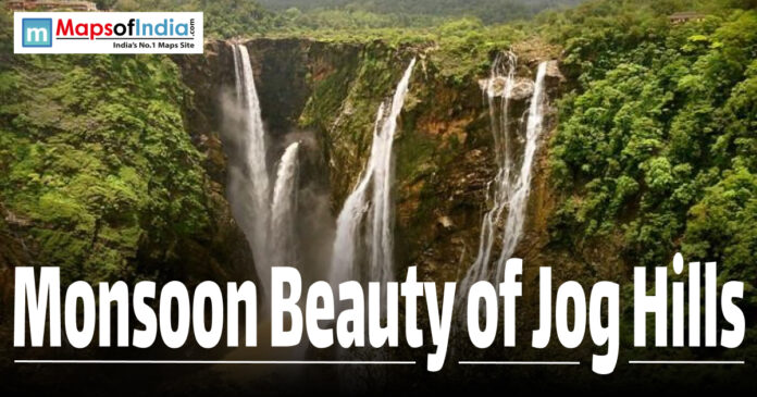 Jog Falls plummeting through lush green cliffs during monsoon.