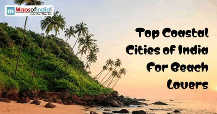 Tropical beach with palm trees and rocky shore at sunset featuring text “Top Coastal Cities of India for Beach Lovers”