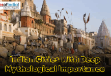 Indian Cities With Deep Mythological Importance Crowded riverfront ghat in India with temples and text: "Indian Cities With Deep Mythological Importance."