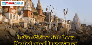 Indian Cities With Deep Mythological Importance Crowded riverfront ghat in India with temples and text: "Indian Cities With Deep Mythological Importance."
