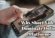 Why Short Videos Dominate Online Platforms Hand holding a smartphone displaying short video content with the text “Why Short Videos Dominate Online Platforms”.