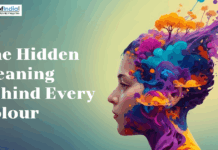 The Hidden Meaning Behind Every Colour Profile of a person with vibrant, colorful abstract patterns and trees bursting from their head.