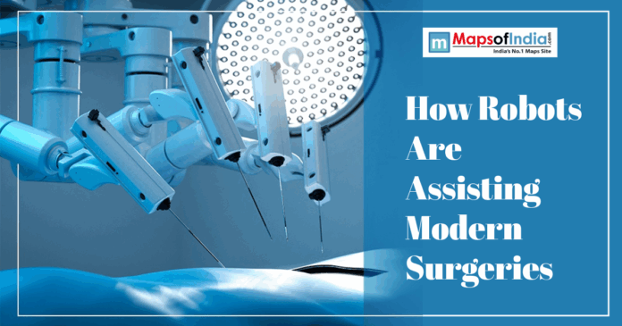 Modern surgery Robotic surgical arms hovering over a patient table from Modern surgery .jpg, captioned "How Robots Are Assisting Modern Surgeries."