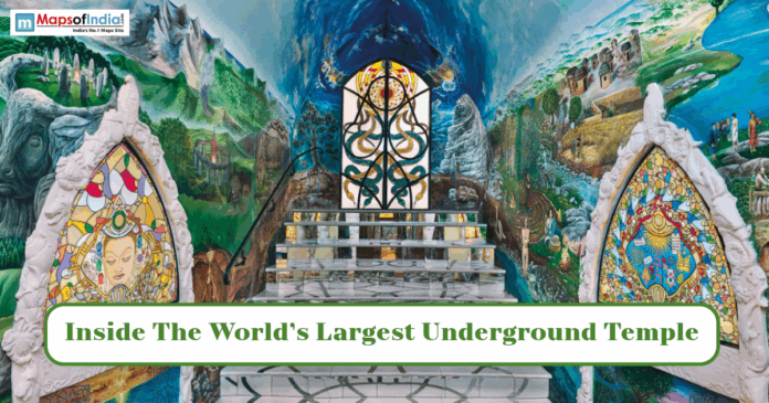 Underground temples Colorful interior of a large underground temple featuring intricate murals, stained-glass artwork, and a grand central altar.
